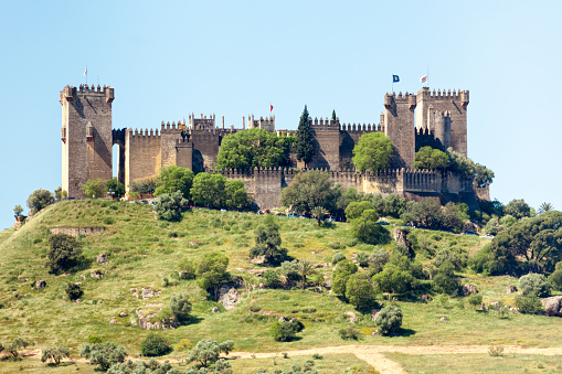 Almodóvar de Rio, Spain - May 2, 2016: The castle of Muslim origin previously was a Roman fort, the current structure has Berber origins. In the 14th century it was a royal residence of Pedro I and Enrique II.