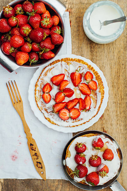 istock Strawberries and whipped cream  for dessert. 541578858