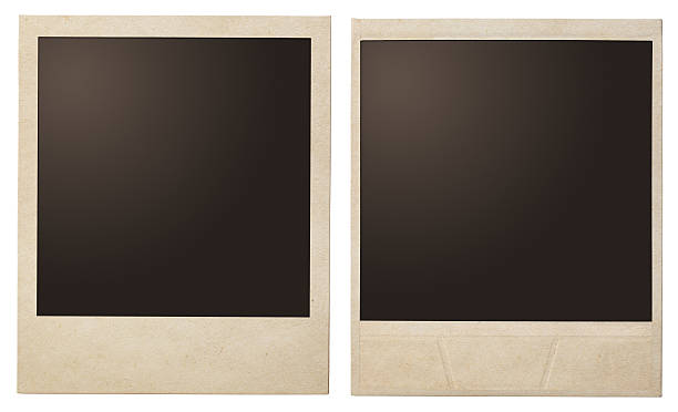 istock Old Polaroid photo both sides isolated on white. 541580026