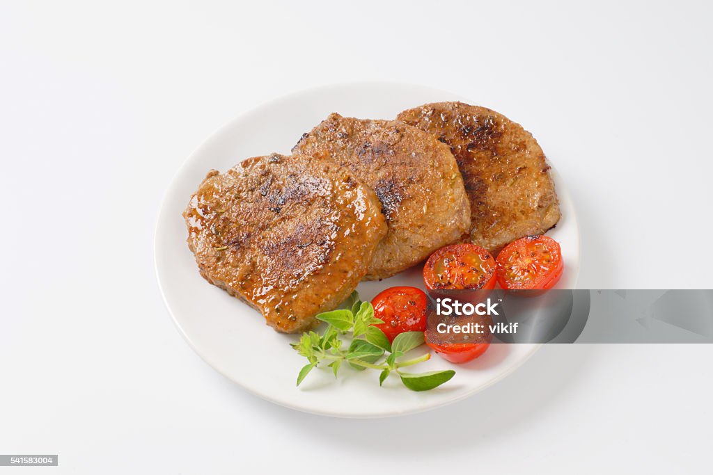 herb rubbed pork chops roasted herb rubbed boneless pork chops Boneless Meat Stock Photo