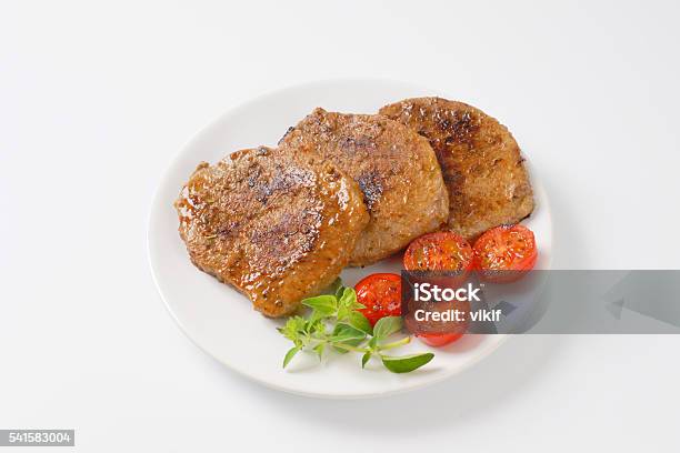 Herb Rubbed Pork Chops Stock Photo - Download Image Now - Boneless Meat, Cooked, Loin