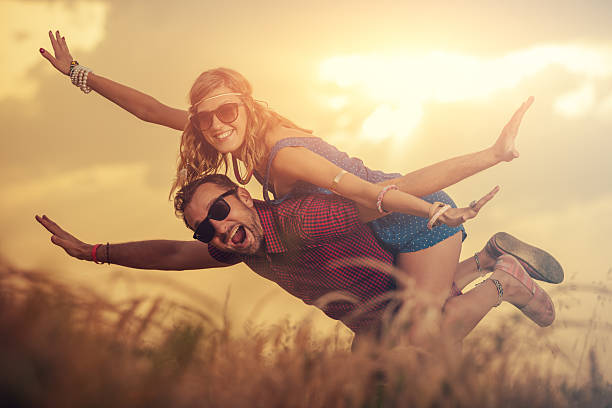istock Couple enjoying outdoors in a wheat field. 541583750