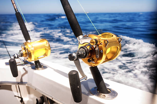 Ocean Fishing Reels On A Boat In The Ocean Stock Photo - Download Image Now  - Sea, Fishing Reel, Fishing - iStock