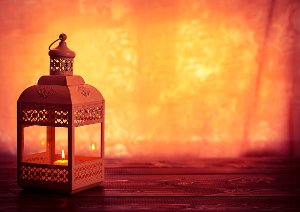 Beautiful background with a shining lantern Fanus. The Muslim feast of the holy month of Ramadan Kareem. Free space for your text