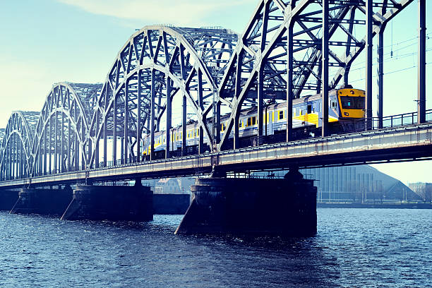 istock The train on a railway bridge in Riga 541586544