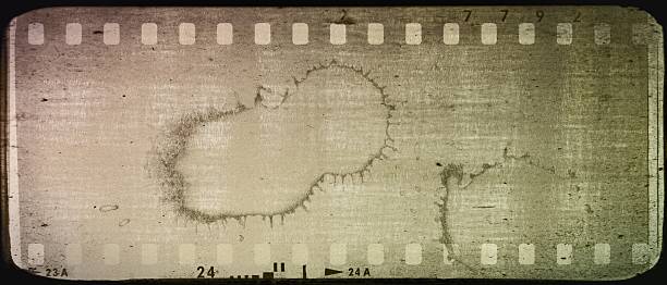 istock Vintage film strip frame background 541586918