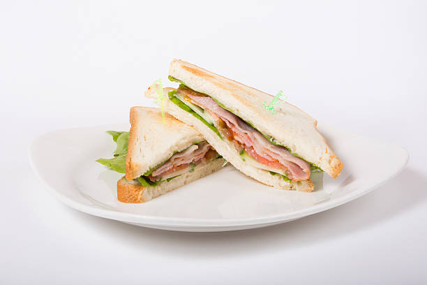 istock Fresh sandwiches on a white plate 541588698
