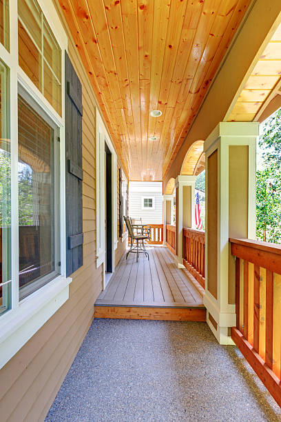 istock Nice small balcony, wooden terrace with columns and railings. 541589006