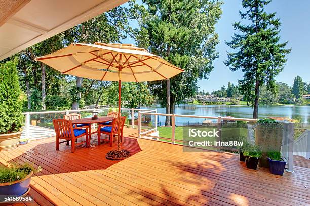 Sitting Room Area On Screened Walkout Deck With Patio Table Stock Photo - Download Image Now