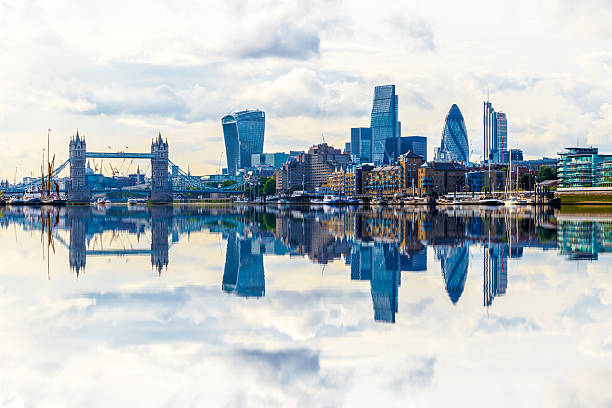 London Cityscape with Reflection from Thames London cityscape with dramatic clouds with its reflection from river Thames 20 fenchurch street photos stock pictures, royalty-free photos & images