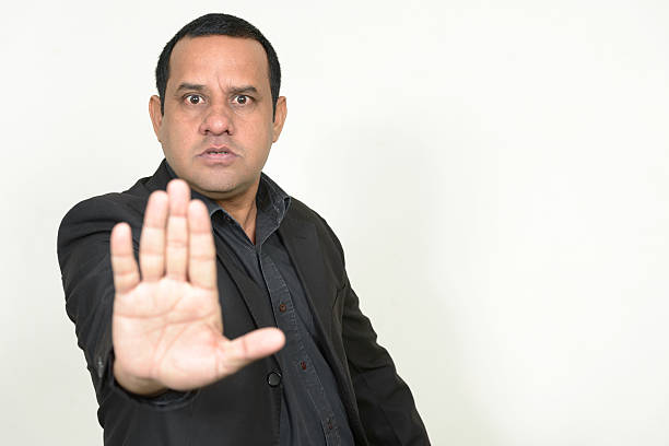 istock Angry businessman showing STOP 541591992