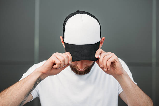 istock Hipster wearing white blank t-shirt and a cap 541592856