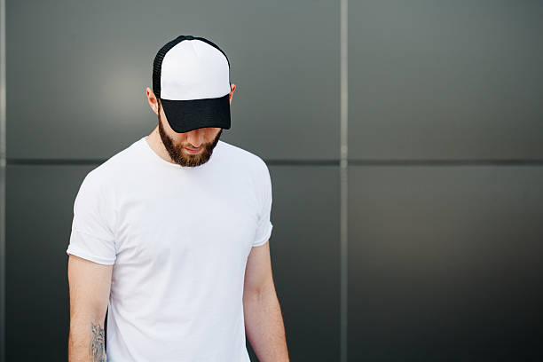 istock Hipster wearing white blank t-shirt and a cap 541592908