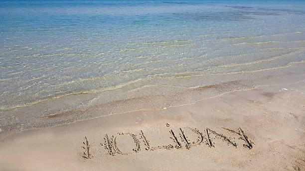istock Vacation concept on the beach. Word Summer lettering. 541592952