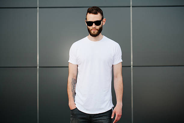 istock Hipster wearing white blank t-shirt with space for your logo 541593308