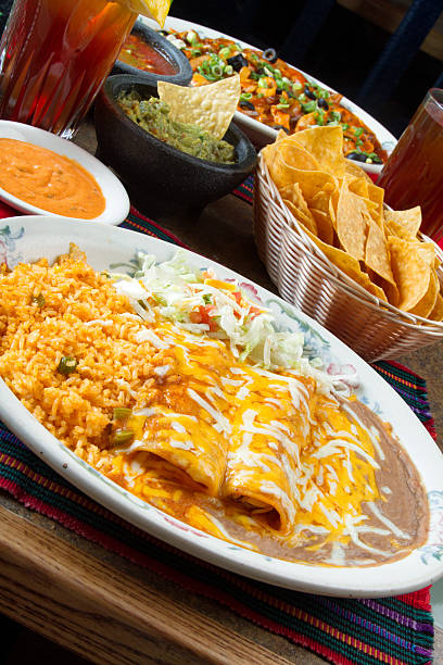 istock Cheesy Enchiladas in a Mexican Restaurant 541594958