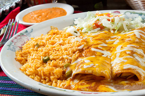istock Cheesy Enchiladas in a Mexican Restaurant 541596100