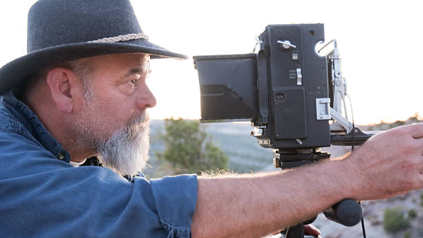 istock Mature Male Photographer with Medium Format Camera 541596434