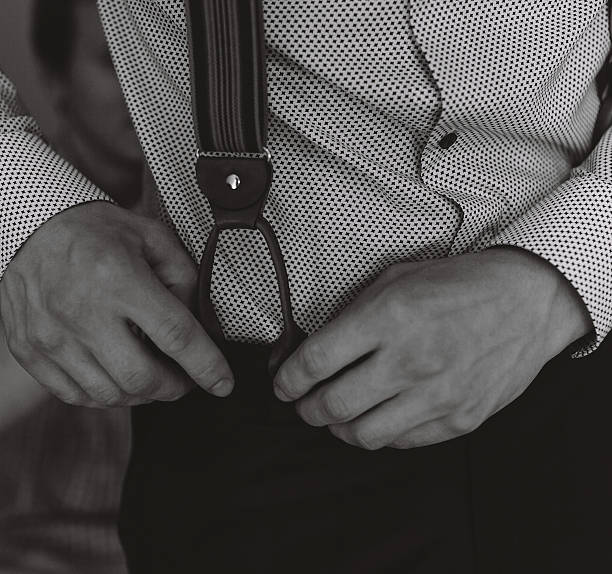 istock groom in the morning getting ready 541597544