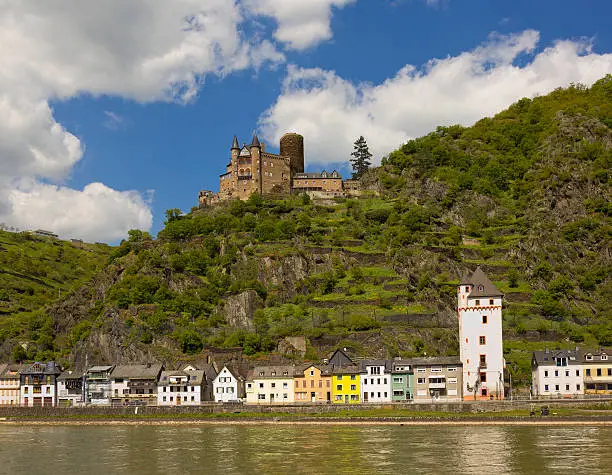 View of small town St. Goarshausen, Germany in Rhineland-Palatinate with Katz Castle on the mountain above it