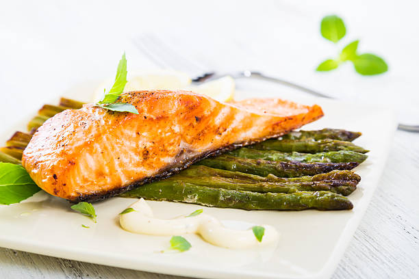 istock Salmon fillet baked with asparagus 541599020