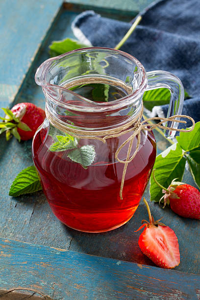 istock Tradition Summer juice drink with strawberries and mint 541601826