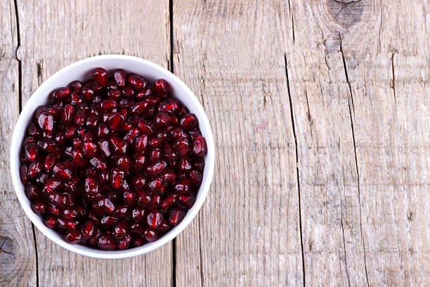 istock Pomegranate seeds in a bowl 541605432