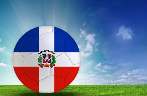 Soccer ball in nature with Dominican republic flag