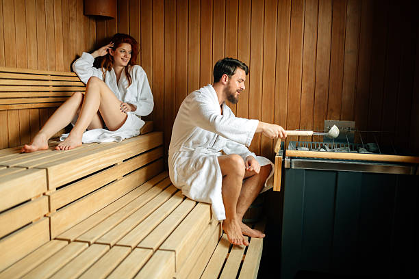 istock Beautiful couple relaxing in sauna 541606902