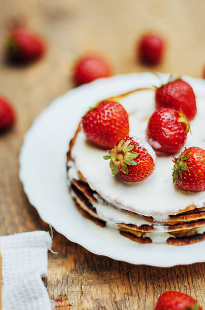 istock Strawberries and whipped cream  for dessert. 541608476