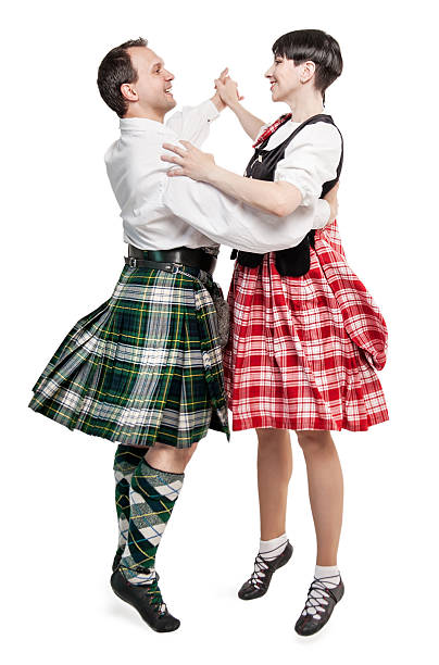 istock The pair woman and man dancing Scottish dance 541609574