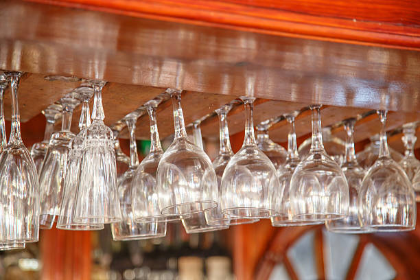 istock Empty glasses hanging over in restaurant bar 541610792