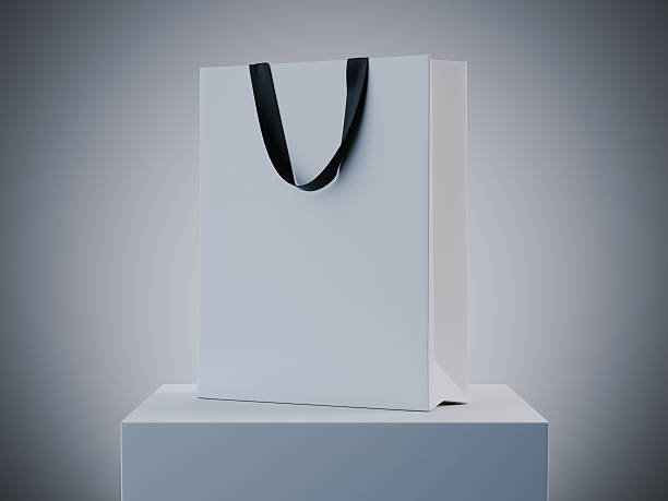 istock White shopping bag on podium. 3d rendering 541822936
