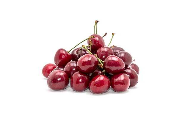 istock Heap of cherries on white 541822980