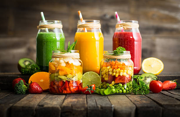 istock Healthy fruit and vegetable salad and smoothies in the jar 541823288