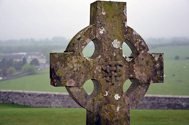 istock celtic cross on the graveyard nature landscape 541825626