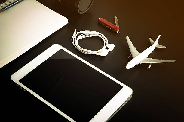 istock Tourist Flight Travel online booking on Blank Tablet screen. 541826224