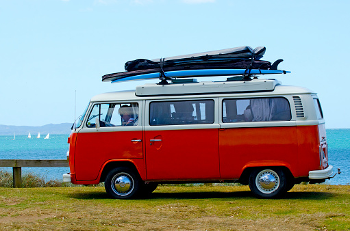 Taipa, New Zealand - January 19, 2013: Classic 1958 Volkswagen Kombi Van during a road trip parks in Taipa beach on January 19, 2013 in Taipa, New Zealand.