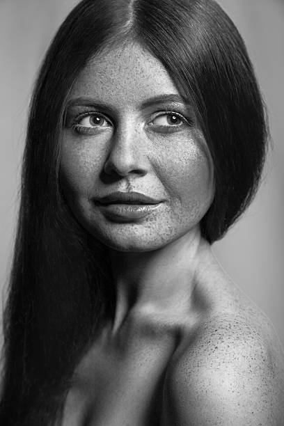 istock Black and white beauty with freckles. 541830064