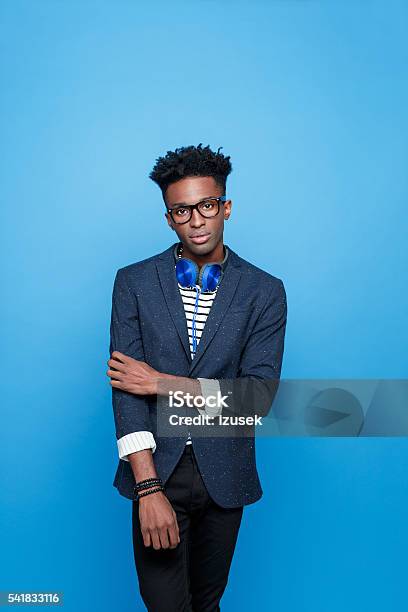 Afro American Guy In Fashionable Outfit Stock Photo - Download Image Now - African Ethnicity, African-American Ethnicity, Colored Background