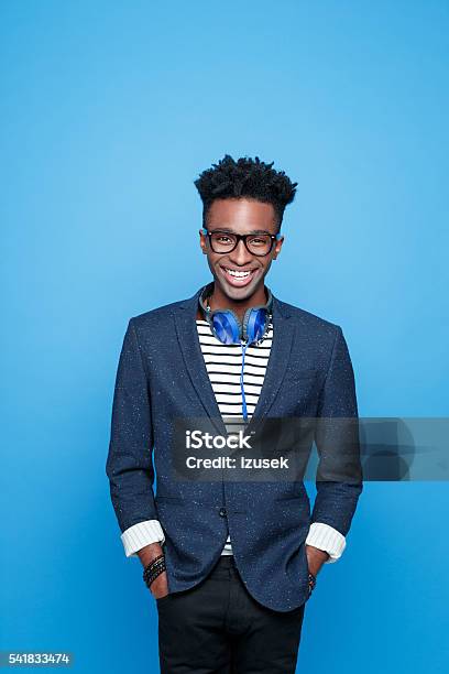 Funky Afro American Guy In Fashionable Outfit Stock Photo - Download Image Now - African Ethnicity, African-American Ethnicity, Eyeglasses