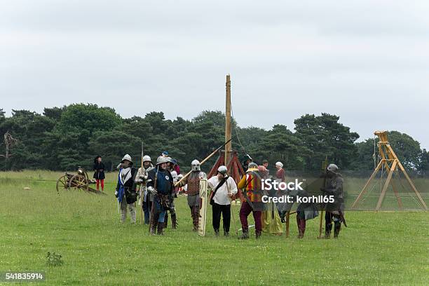 Medieval Warfare At The Old Hall Cheshire Stock Photo - Download Image Now - Acting - Performance, Adult, Adults Only