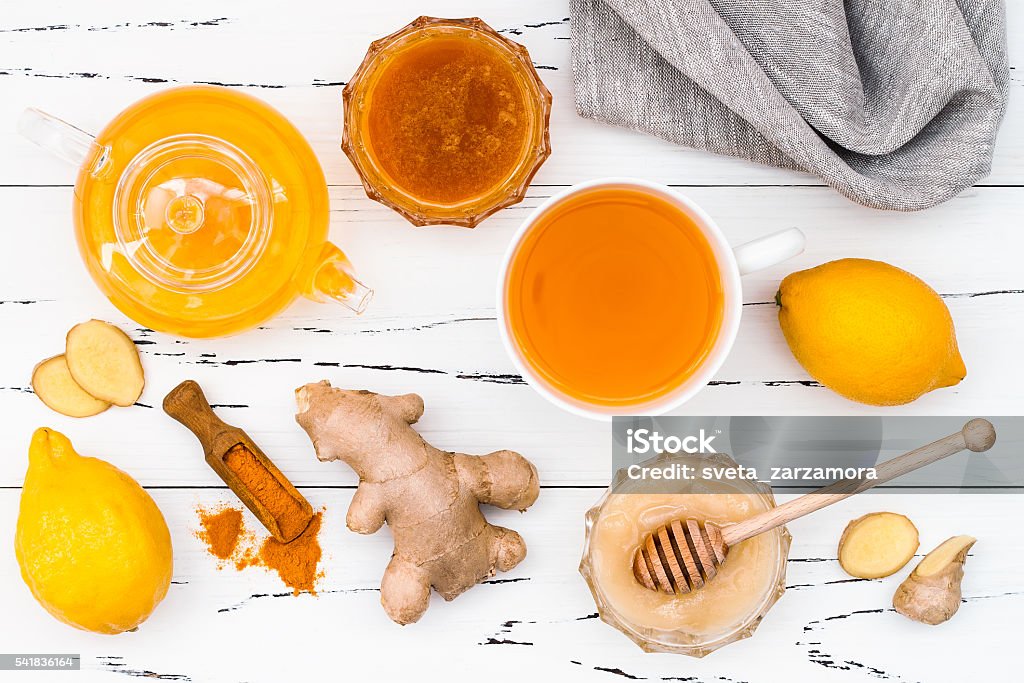 Detox hot lemon water with ginger, cayenne, turmeric and honey Hot lemon water with ginger, cayenne, turmeric and honey. Detox liver fat burnner, immune boosting, anti inflammatory healthy drink Anti-inflammatory Stock Photo