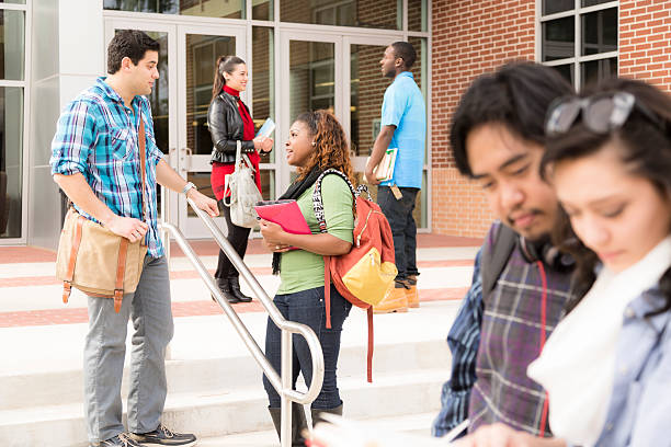 istock Education: Multi-ethnic group of college students talk on campus. 541837096