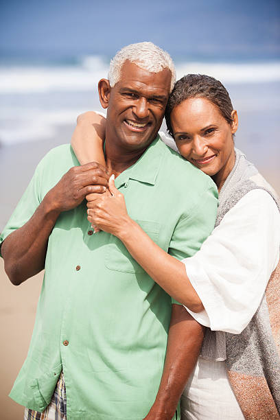 istock African American Seniors Smiling Together on Beach 541837576