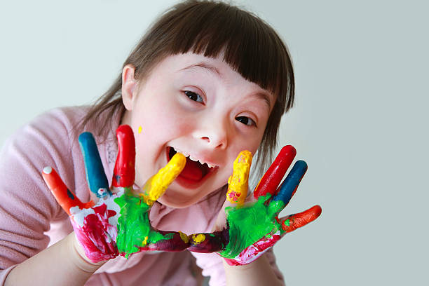 istock Cute little girl with painted hands 541837618
