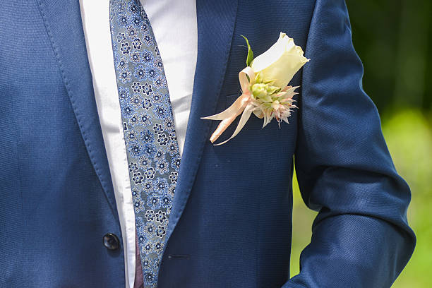 istock flower boutonniere for the groom 541841406