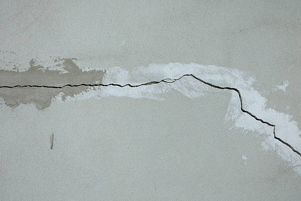 Cracked concrete wall stock photo