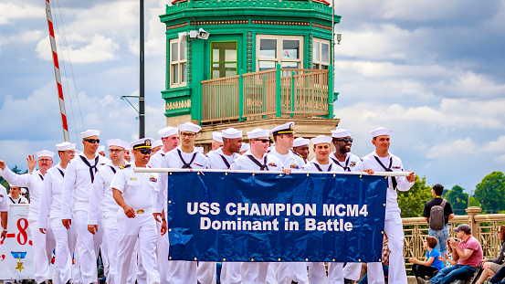 Portland, Oregon, United States - June 11, 2016: Crew Members of Rose Festival Fleet United States Navy in the Grand Floral Parade during Portland Rose Festival 2016.