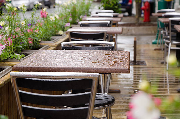 istock Wet table on an outside restaurant patio after rain 541846770